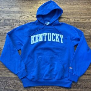 KENTUCKY WILDCATS BLUE (CHAMPION) HOODIE. Embroidered patch front.